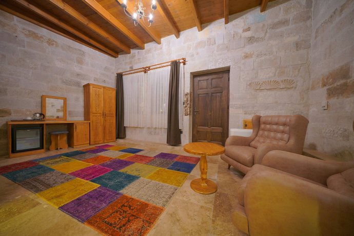 Imagen de la habitación del Secret Hill Cave Suites. Foto 19