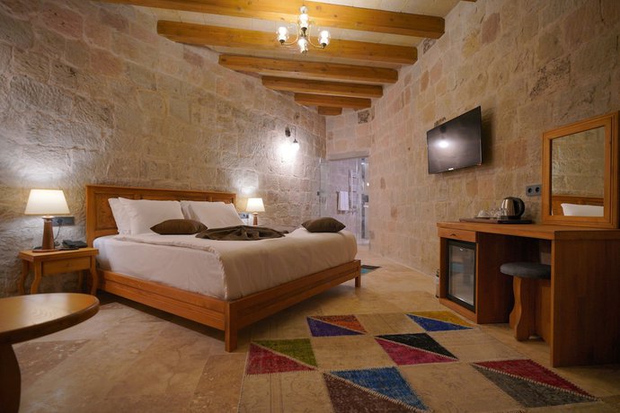 Imagen de la habitación del Secret Hill Cave Suites. Foto 20