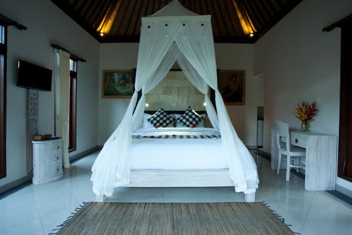 Imagen de la habitación del Segening Villa. Foto 11