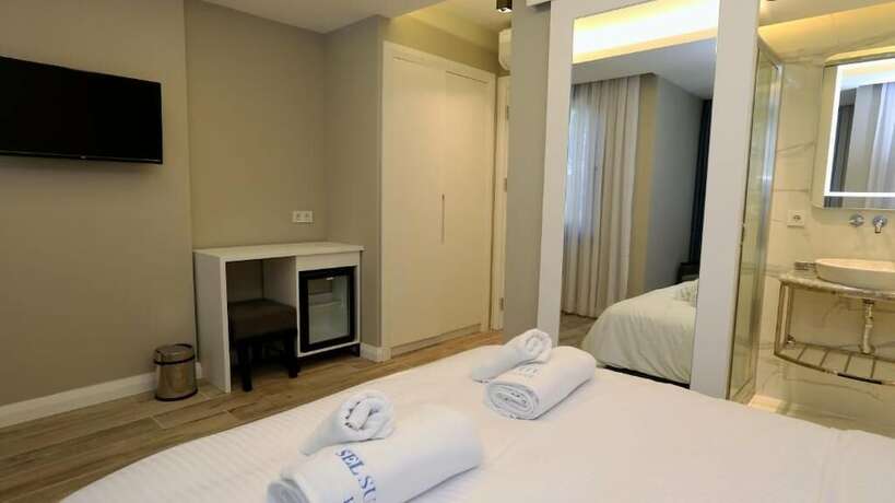 Imagen de la habitación del Sel Suite Hotel. Foto 15