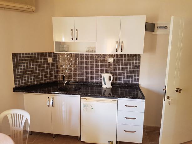 Imagen de la habitación del Selenya Apart Hotel. Foto 16