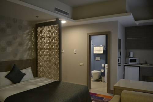 Imagen de la habitación del Sen Hotel Suites & Residence. Foto 2
