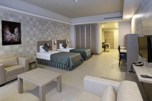 Imagen de la habitación del Sen Hotel Suites & Residence. Foto 3