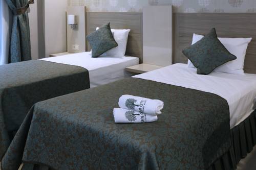 Imagen de la habitación del Sen Hotel Suites & Residence. Foto 4