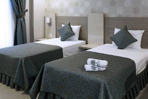 Imagen de la habitación del Sen Hotel Suites & Residence. Foto 5