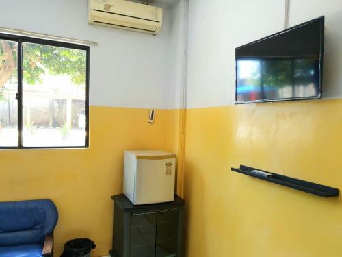 Imagen de la habitación del Sentosa Hotel & Restaurant - tersertifikasi CHSE dari Kementerian Pariwisata dan Ekonomi Kreatif. Foto 20
