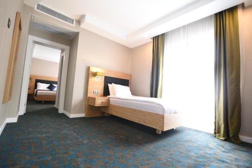 Imagen de la habitación del Sera Nature Hotel. Foto 7