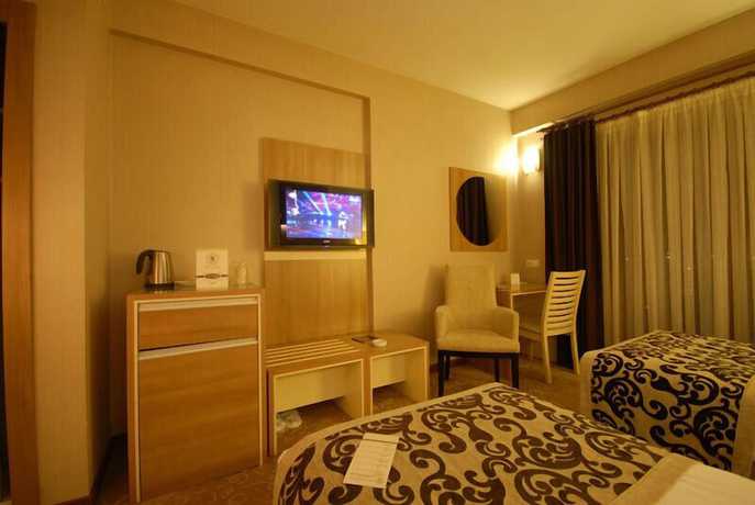 Imagen de la habitación del Serace Hotel. Foto 9