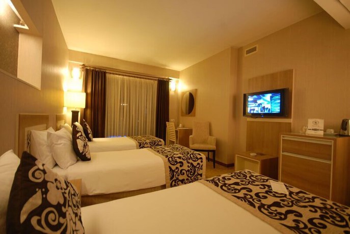 Imagen de la habitación del Serace Hotel. Foto 13