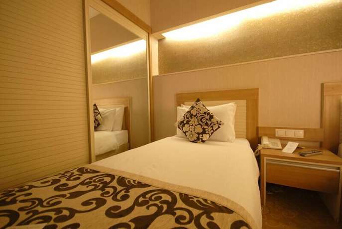 Imagen de la habitación del Serace Hotel. Foto 17