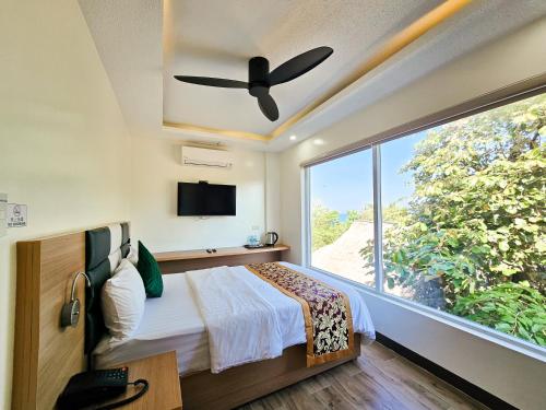 Imagen de la habitación del Serenity Beach Hotel. Foto 15