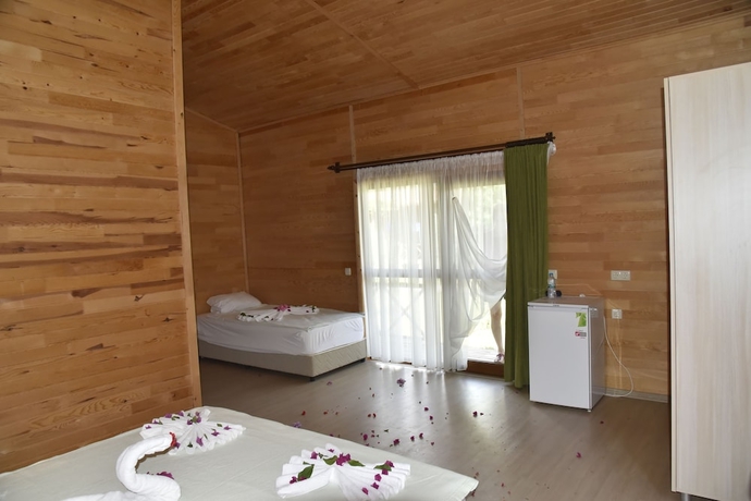 Imagen de la habitación del Serenity Bungalows. Foto 11
