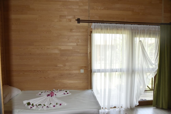 Imagen de la habitación del Serenity Bungalows. Foto 15