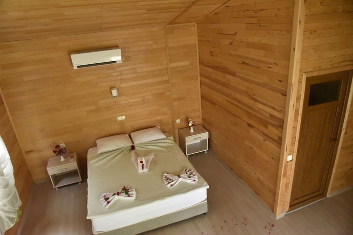Imagen de la habitación del Serenity Bungalows. Foto 16