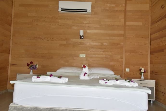 Imagen de la habitación del Serenity Bungalows. Foto 17
