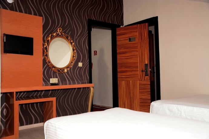 Imagen de la habitación del Serenity Suit Hotel. Foto 7