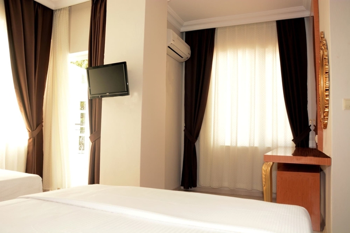 Imagen de la habitación del Serenity Suit Hotel. Foto 13