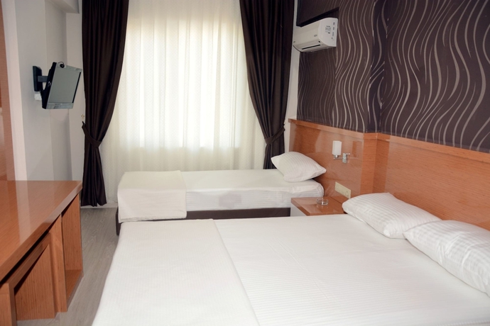 Imagen de la habitación del Serenity Suit Hotel. Foto 14