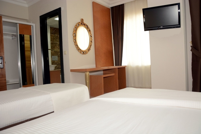 Imagen de la habitación del Serenity Suit Hotel. Foto 15