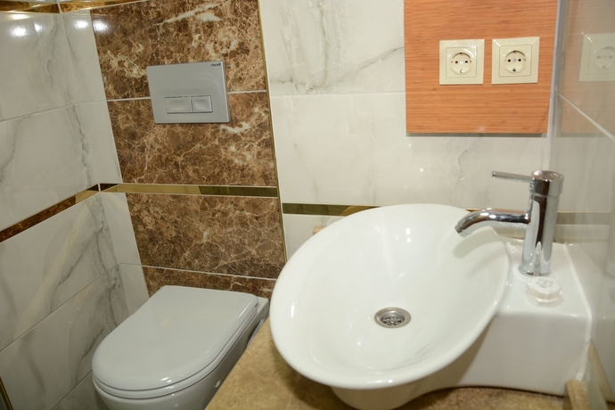 Imagen de la habitación del Serenity Suit Hotel. Foto 16
