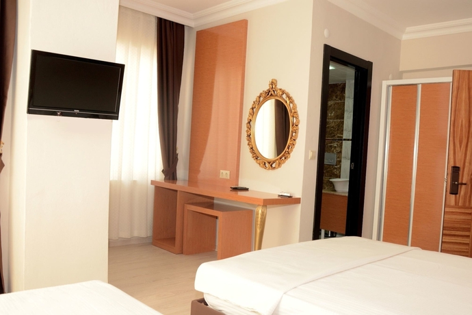 Imagen de la habitación del Serenity Suit Hotel. Foto 17