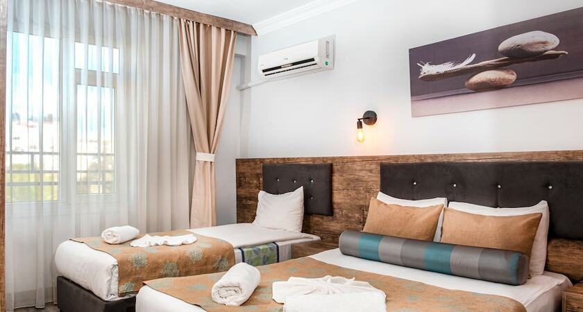 Imagen de la habitación del Seven City Hotel. Foto 11