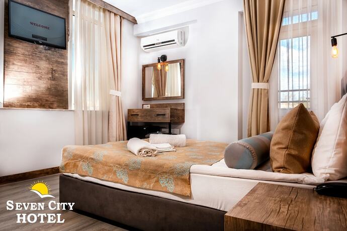 Imagen de la habitación del Seven City Hotel. Foto 17