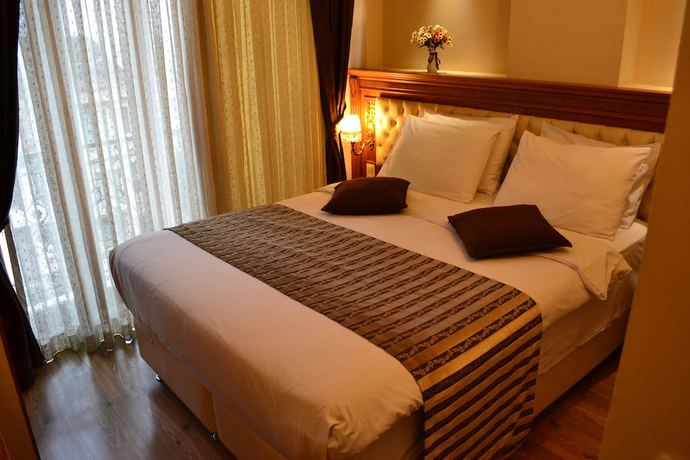 Imagen de la habitación del Seven Days Hotel. Foto 15
