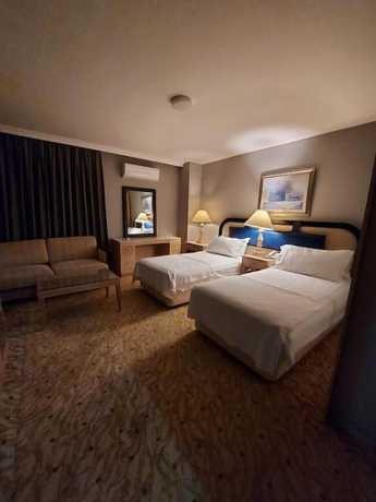 Imagen de la habitación del Sever Suites Hotel. Foto 6