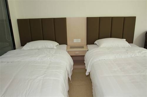 Imagen de la habitación del Shanshui Shishang Bama Bipoyuan Hotel. Foto 2