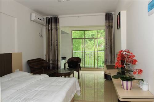 Imagen de la habitación del Shanshui Shishang Bama Bipoyuan Hotel. Foto 4