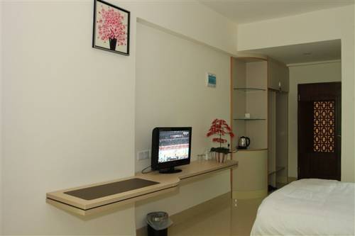 Imagen de la habitación del Shanshui Shishang Bama Bipoyuan Hotel. Foto 5