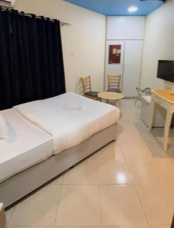 Imagen de la habitación del Sharjah plaza Hotel. Foto 12