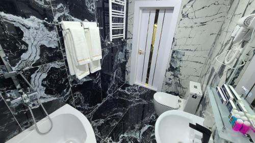 Imagen de la habitación del Shedevr Plaza Navoiy. Foto 17