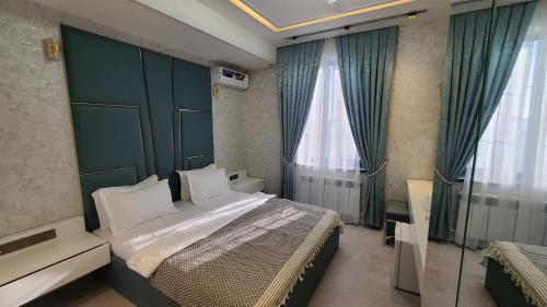 Imagen de la habitación del Shedevr Plaza Navoiy. Foto 18