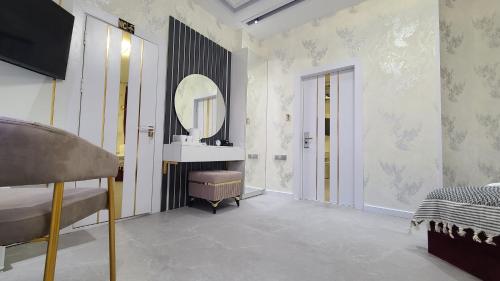 Imagen de la habitación del Shedevr Plaza Navoiy. Foto 19