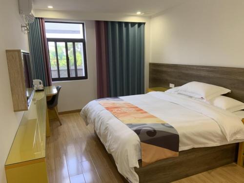 Imagen general del Shell Liu\'an Wanxi Avenue International Motor City Hotel. Foto 1
