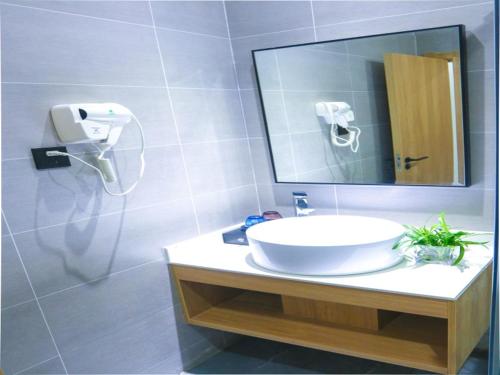 Imagen general del Shell Ningbo Gaoqiao Subway Station Hotel. Foto 11