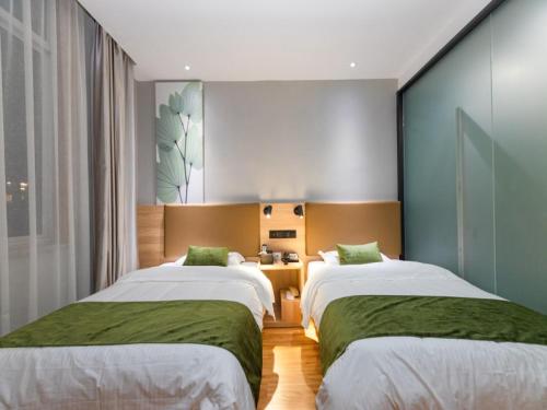 Imagen general del Shell Ningbo Gaoqiao Subway Station Hotel. Foto 14