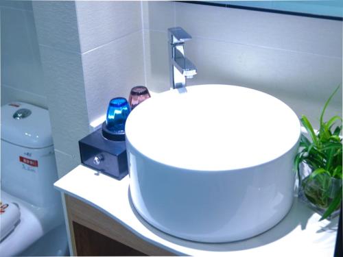 Imagen general del Shell Ningbo Gaoqiao Subway Station Hotel. Foto 15