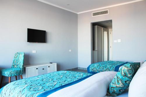 Imagen de la habitación del Shellghada Blue Beach. Foto 20