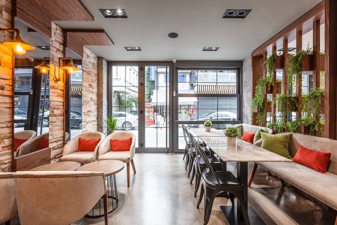 Imagen del bar/restaurante del Sherry Suites Karak&ouml;y. Foto 2
