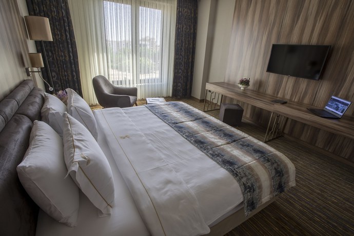Imagen de la habitación del Shimall Deluxe Hotel. Foto 4