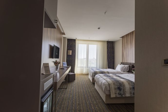 Imagen de la habitación del Shimall Deluxe Hotel. Foto 6