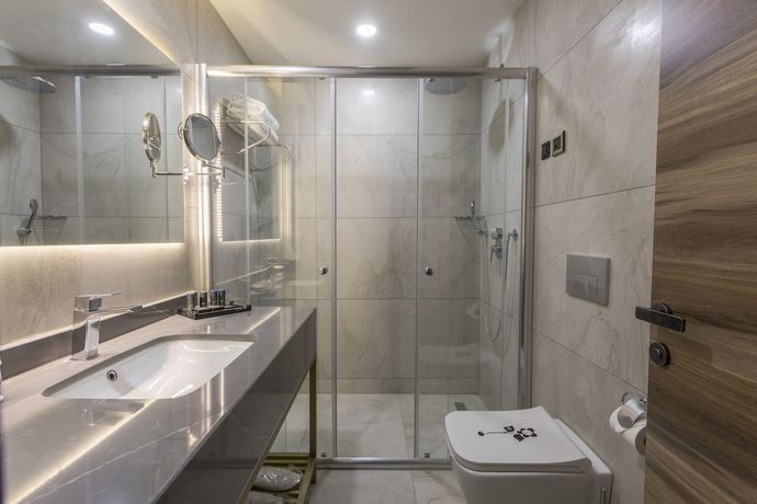 Imagen de la habitación del Shimall Deluxe Hotel. Foto 12
