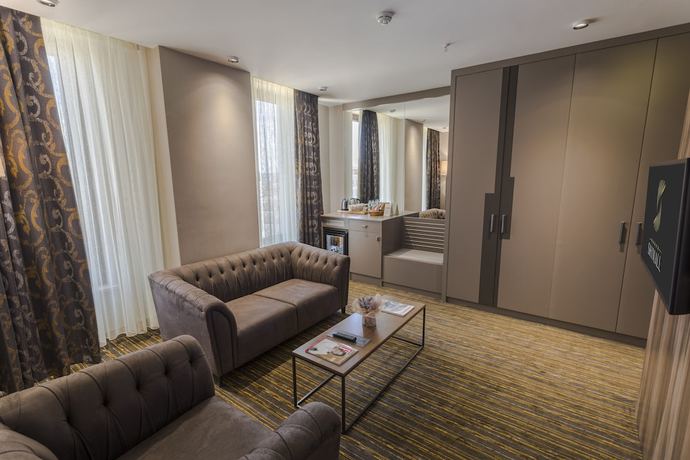 Imagen de la habitación del Shimall Deluxe Hotel. Foto 13