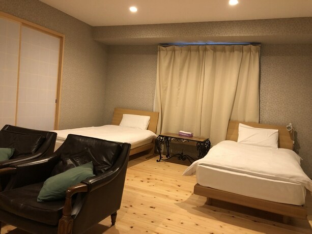 Imagen de la habitación del Shimanouchi Luxury Apartment. Foto 32
