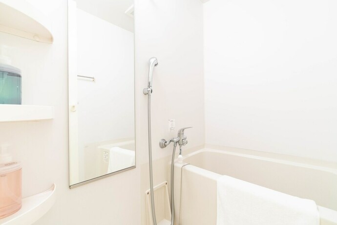 Imagen de la habitación del Shinsaibash East Nana Apartment &middot; Junan. Foto 24