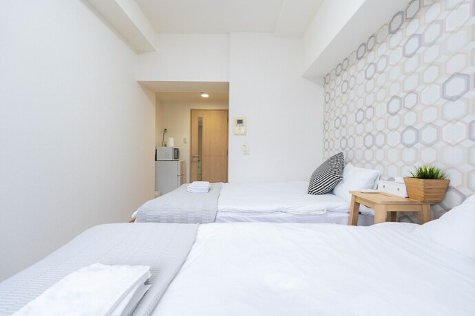 Imagen de la habitación del Shinsaibash East Nana Apartment &middot; Junan. Foto 25
