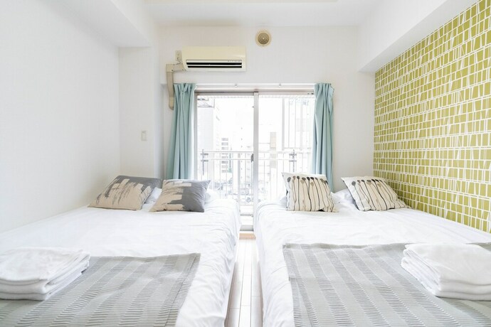 Imagen de la habitación del Shinsaibash East Nana Apartment &middot; Junan. Foto 29